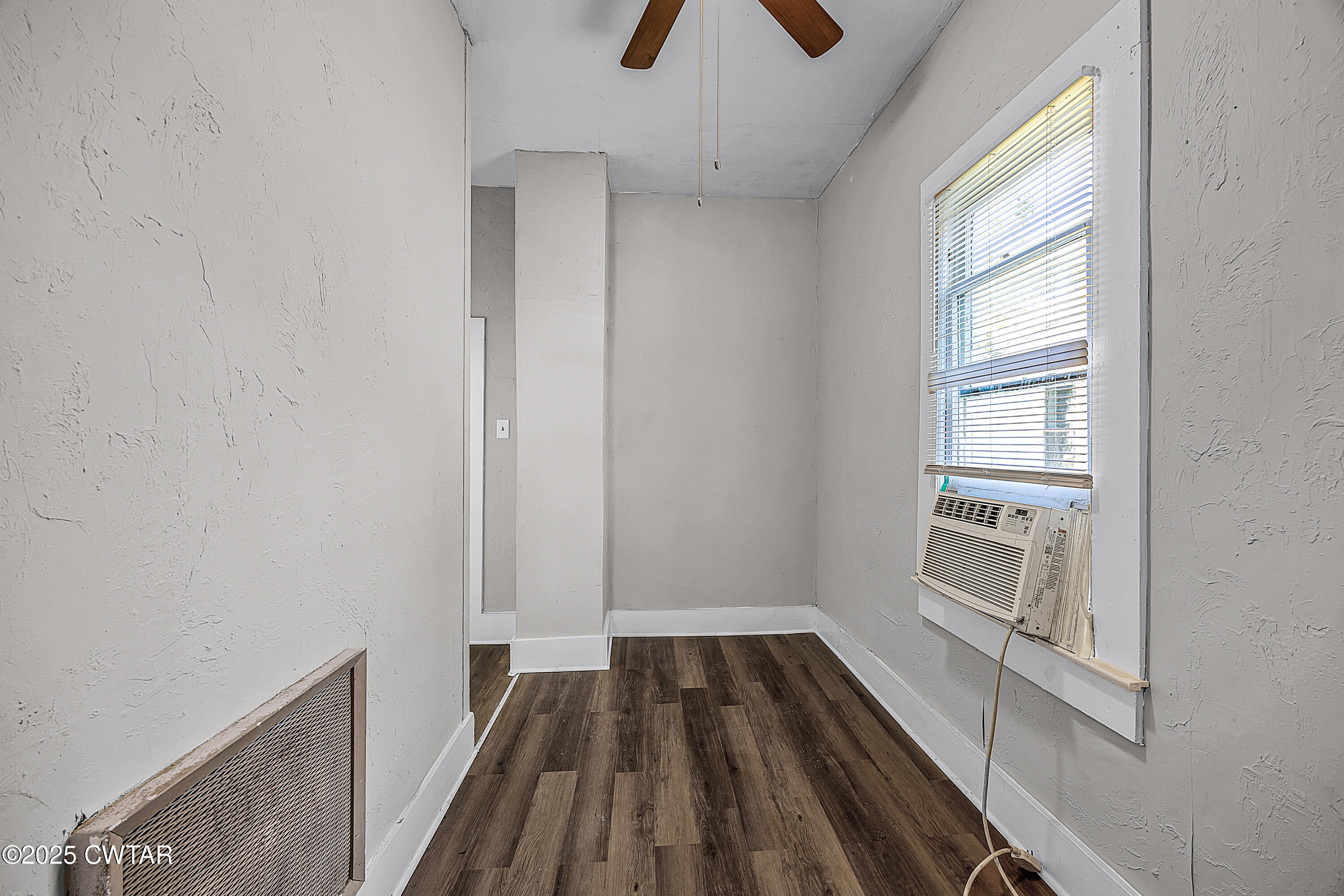 220 Division Avenue Jackson, TN 38301 - Photo 12 of 15 a view of a kitchen with wooden floor and electronic appliances