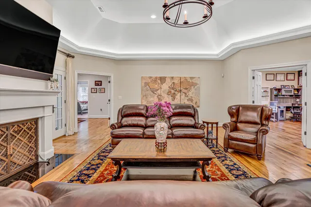 a kitchen with stainless steel appliances granite countertop a refrigerator sink and stove