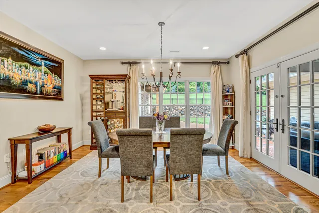 a bedroom with furniture and a book shelf