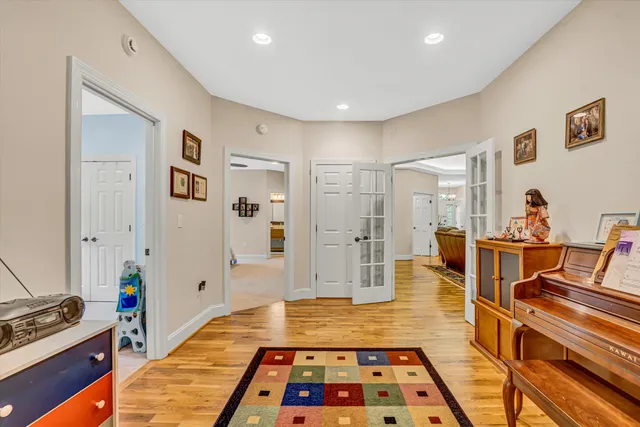 a spacious bathroom with a sink and a mirror