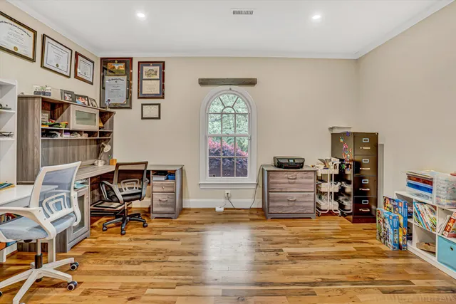 a bathroom with a sink vanity and a mirror
