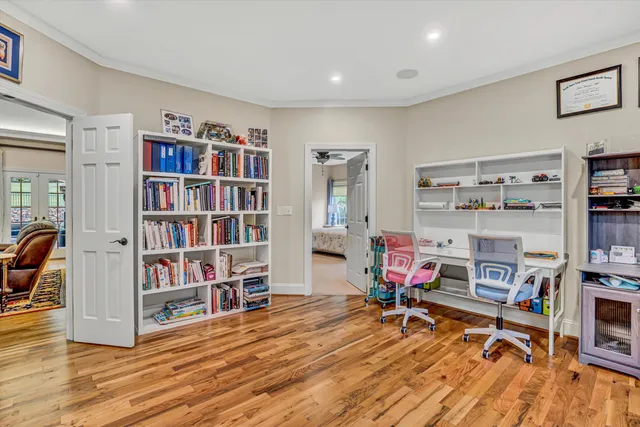 a room with a mirror and a shower