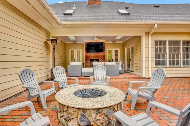 a front view of a house with a yard and porch