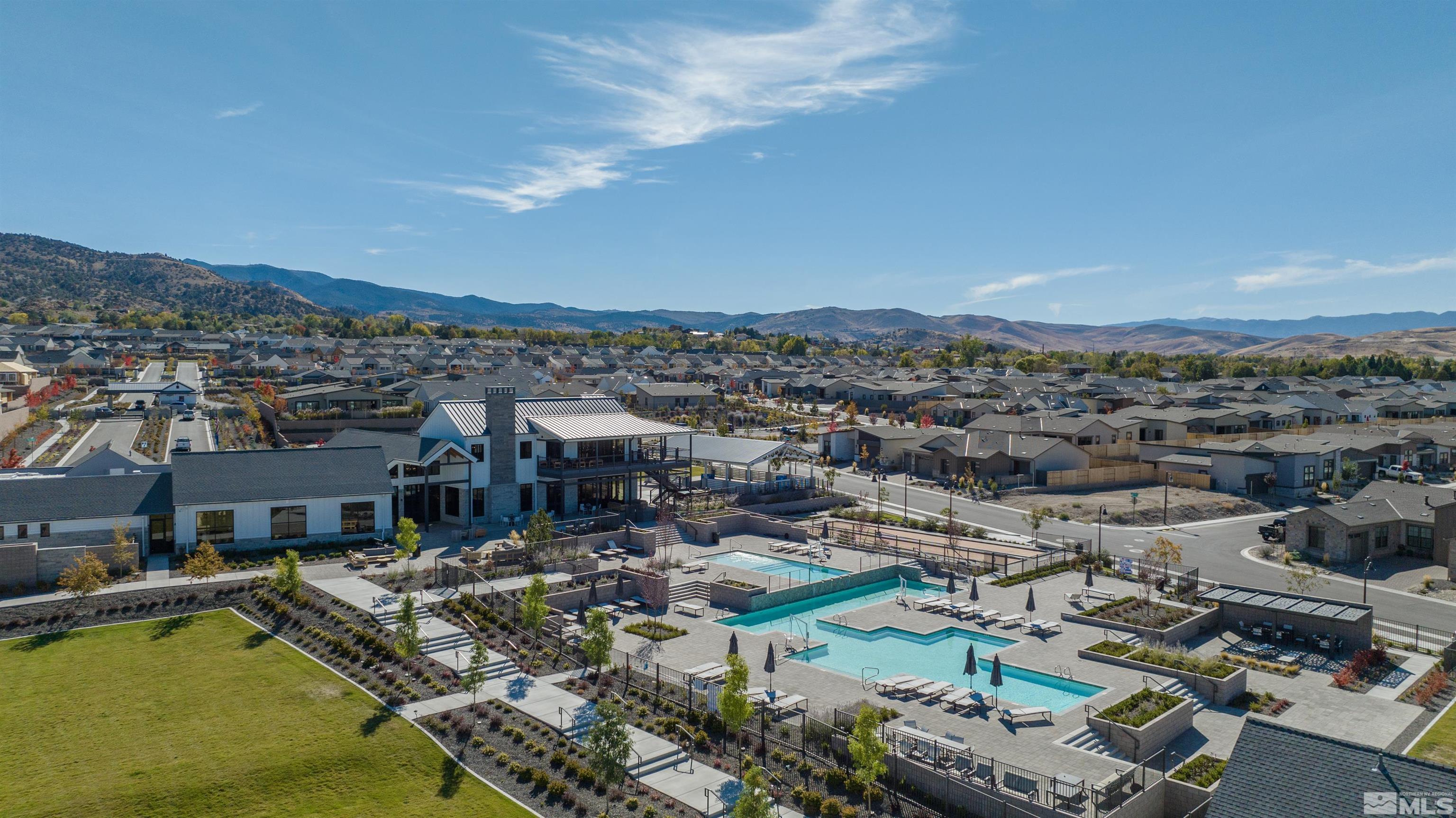 12519 Blue Stream Street, Unit HOMESITE 138 Reno, NV 89521 - Photo 9 of 9 an aerial view of a house with a lake view