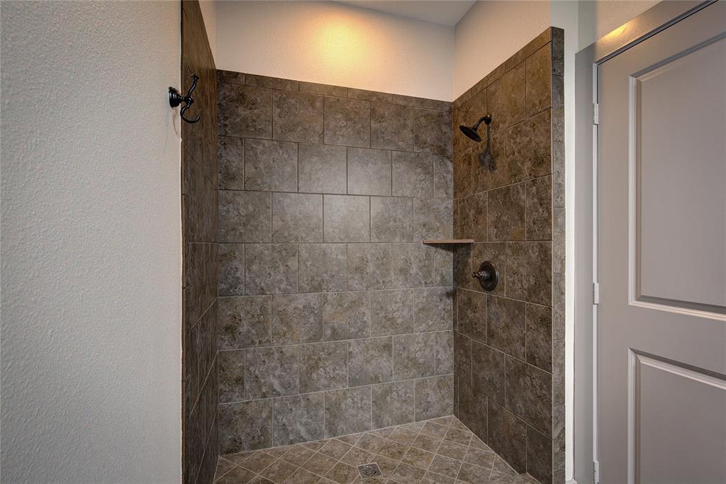 600 Maple Street Commerce, TX 75428 - Photo 27 of 35 a bathroom with a shower