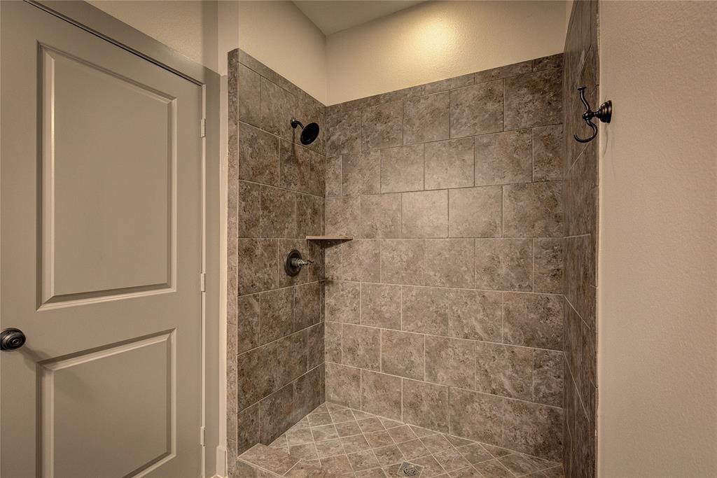 600 Maple Street Commerce, TX 75428 - Photo 31 of 35 a bathroom with a shower