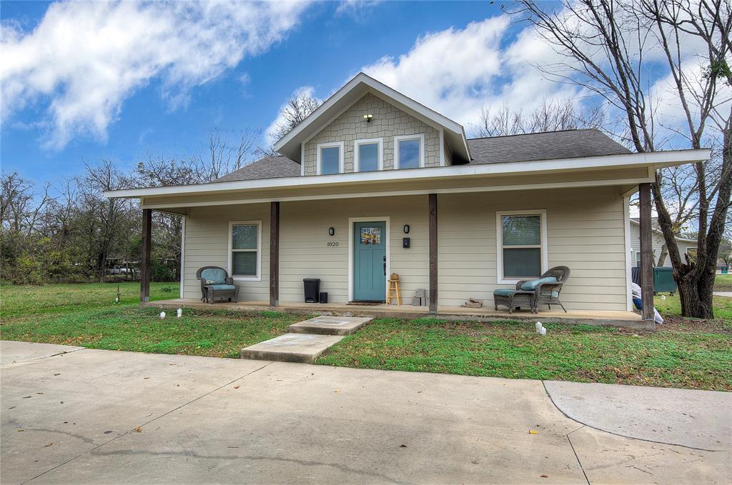 600 Maple Street Commerce, TX 75428 - Photo 35 of 35 front view of a house with a yard