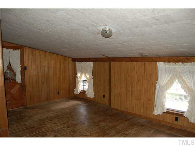 3529 Sturdivant Street Raleigh, NC 27610 - Photo 4 of 13 Partial View of Den With REAL Wood Flooring!
