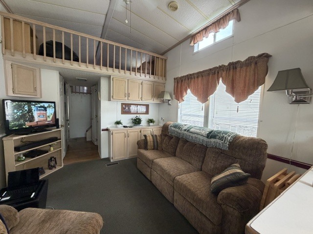 2795 East 28th Road Marseilles, IL 61341 - Photo 5 of 91 a living room with furniture a flat screen tv and a window