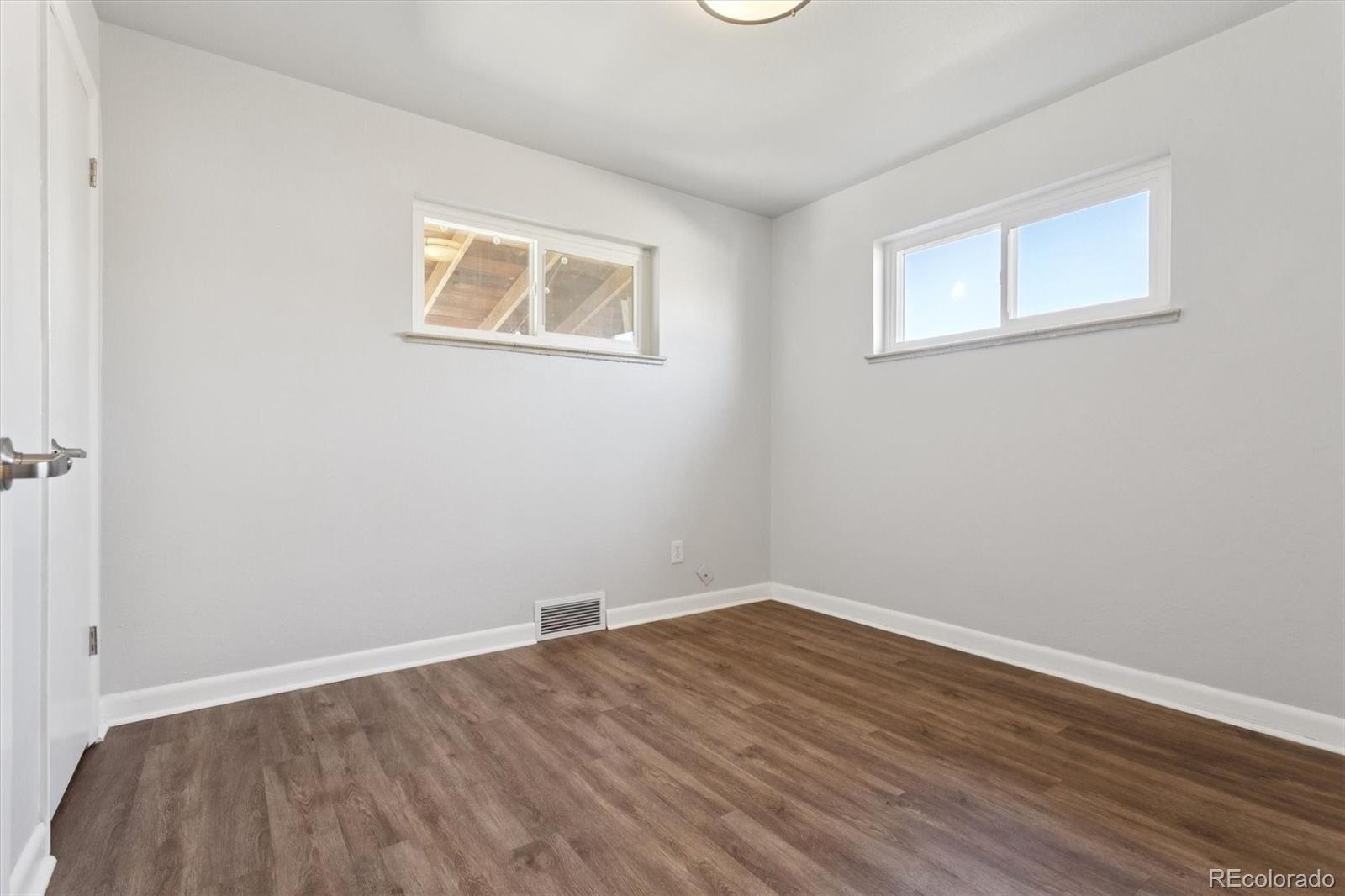 81 South Ingalls Street Lakewood, CO 80226 - Photo 17 of 29 a view of a room with wooden floor and window