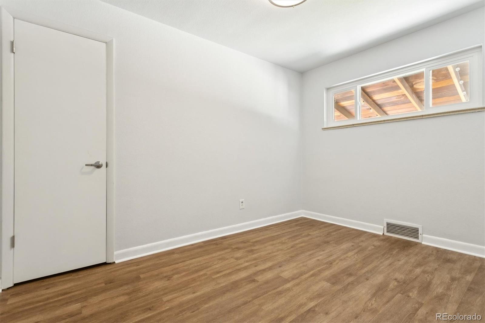 81 South Ingalls Street Lakewood, CO 80226 - Photo 18 of 29 wooden floor in an empty room