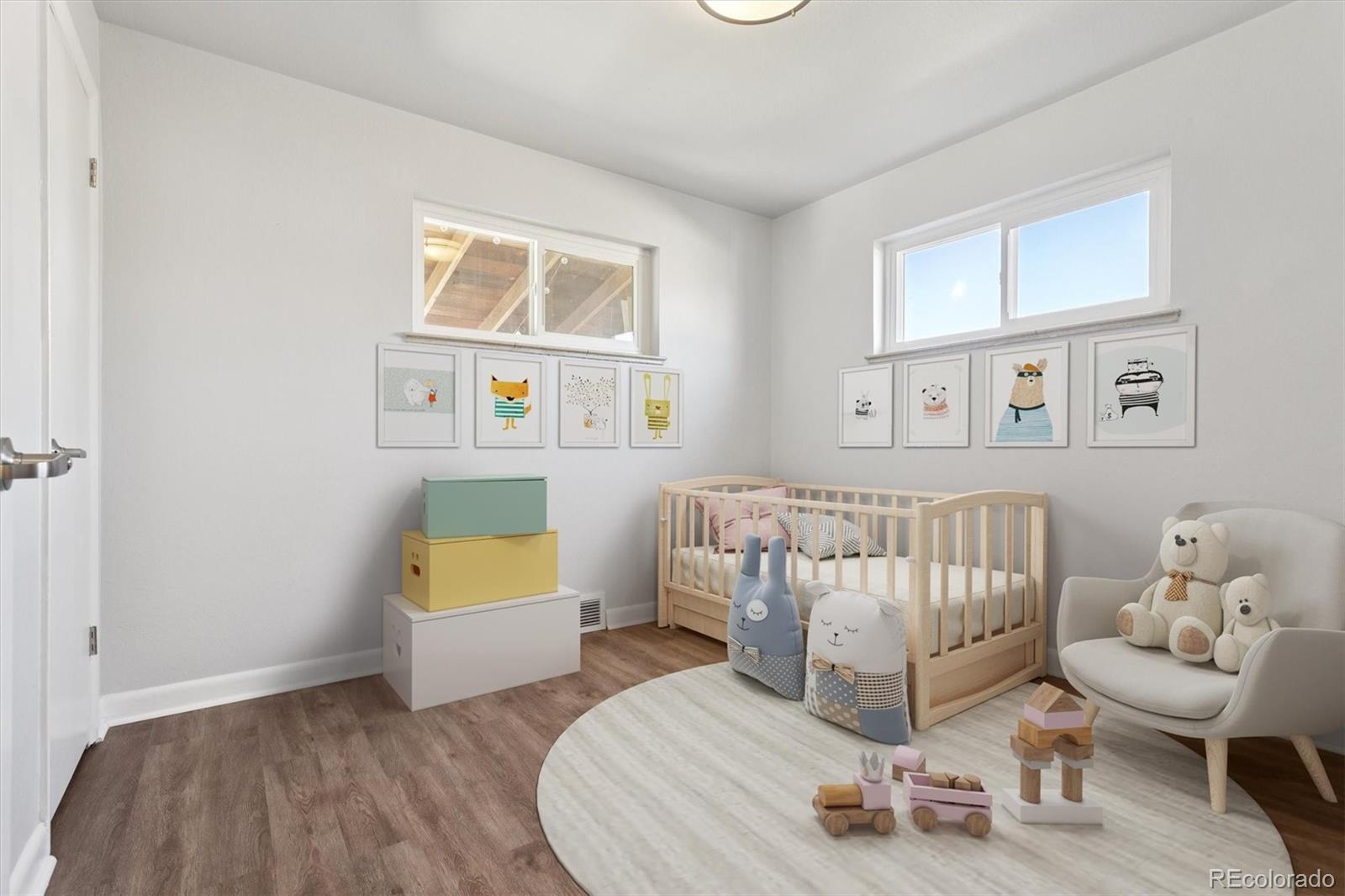 81 South Ingalls Street Lakewood, CO 80226 - Photo 3 of 29 a bedroom with furniture and a window