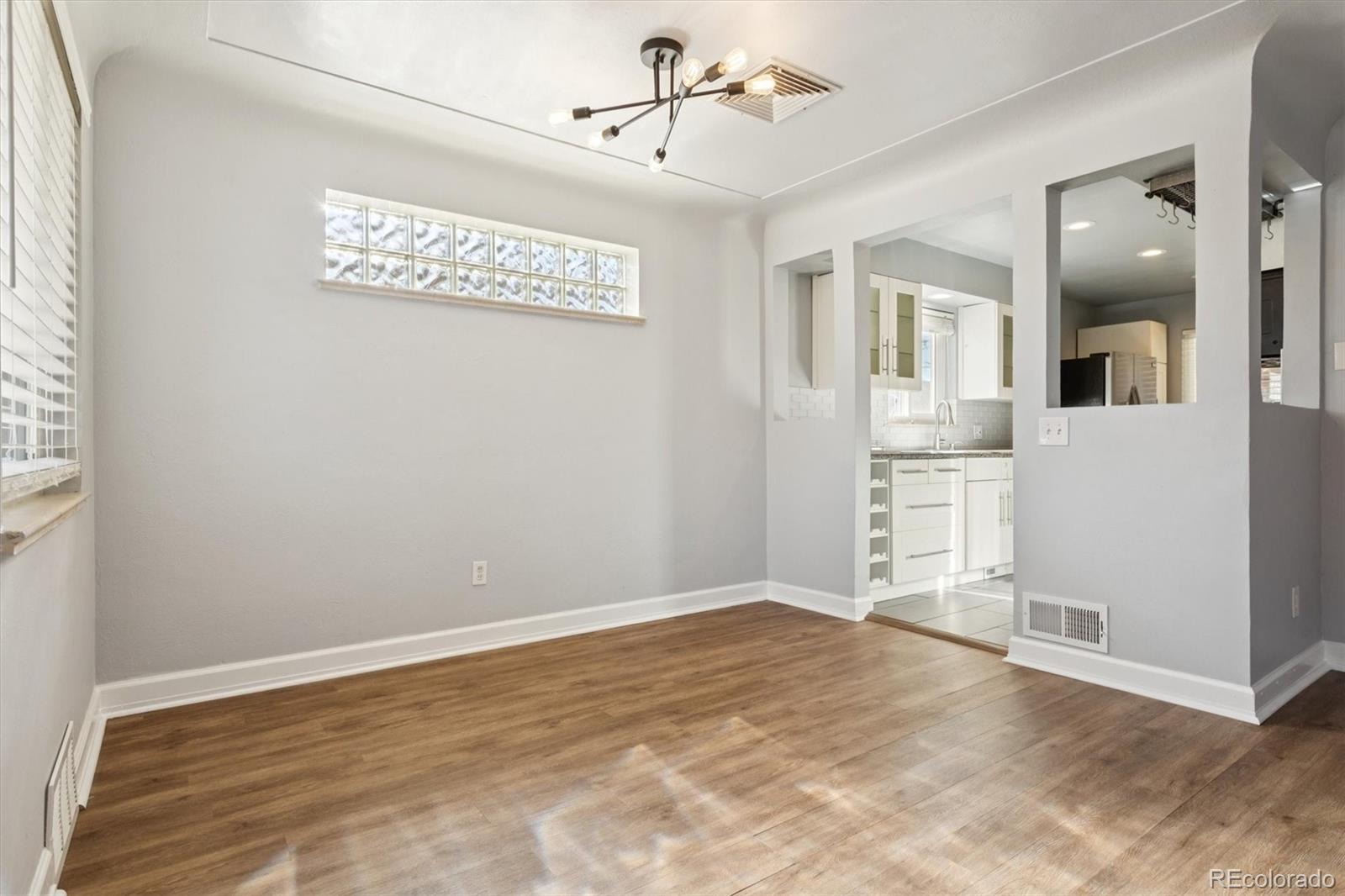 81 South Ingalls Street Lakewood, CO 80226 - Photo 10 of 29 wooden floor in an empty room