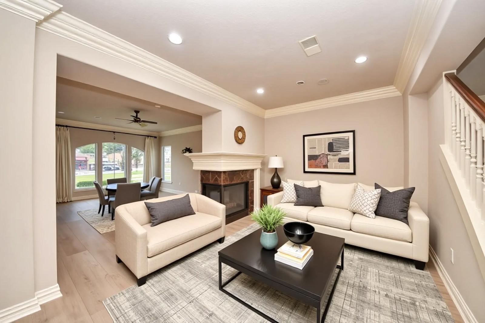 14454 Summerleaf Lane Houston, TX 77077 - Photo 12 of 50 a living room with furniture and a fireplace