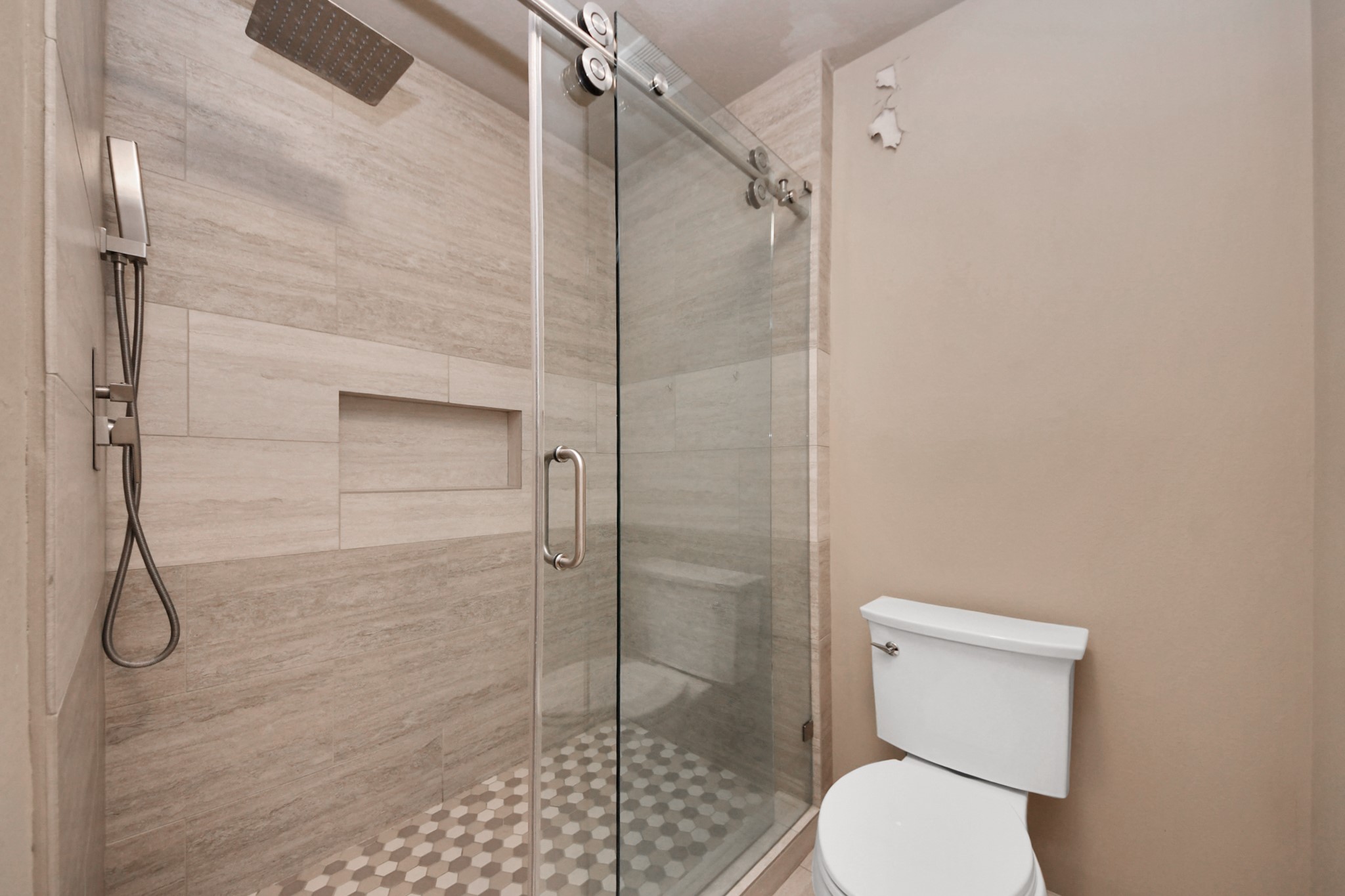 14454 Summerleaf Lane Houston, TX 77077 - Photo 28 of 50 a bathroom with a toilet and a shower