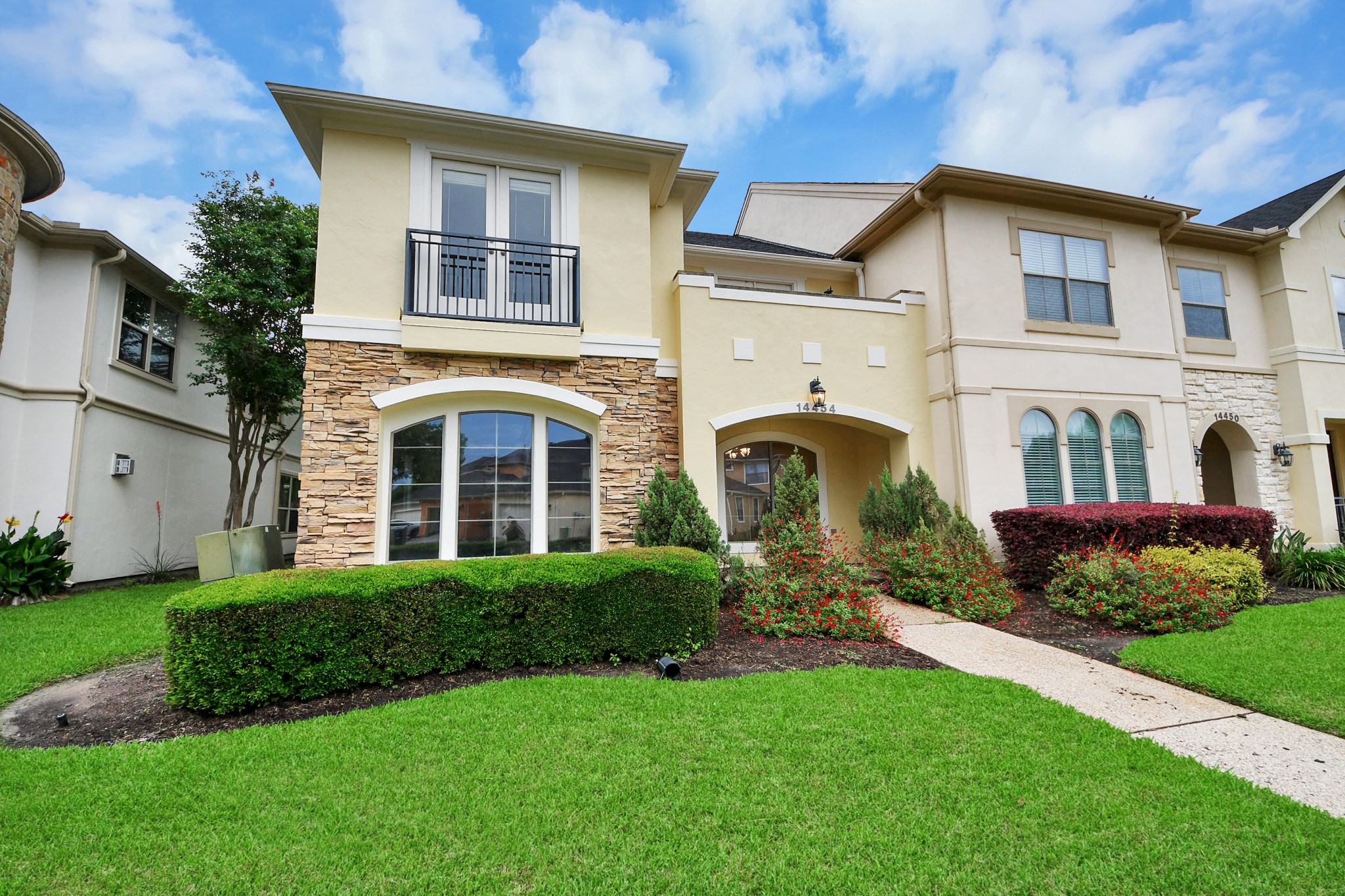14454 Summerleaf Lane Houston, TX 77077 - Photo 3 of 50 a front view of a house with garden