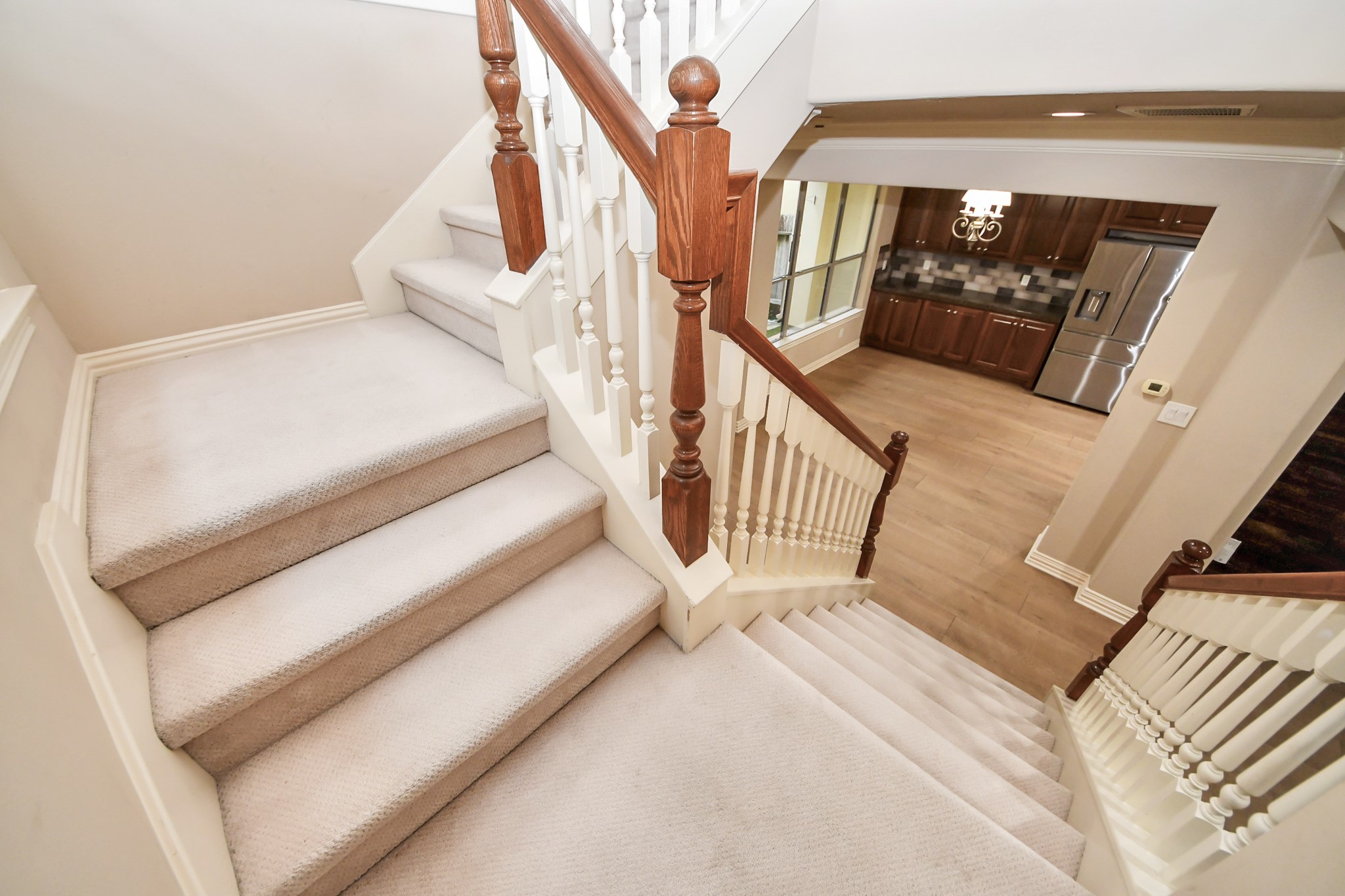 14454 Summerleaf Lane Houston, TX 77077 - Photo 39 of 50 a view of staircase with railing and white walls