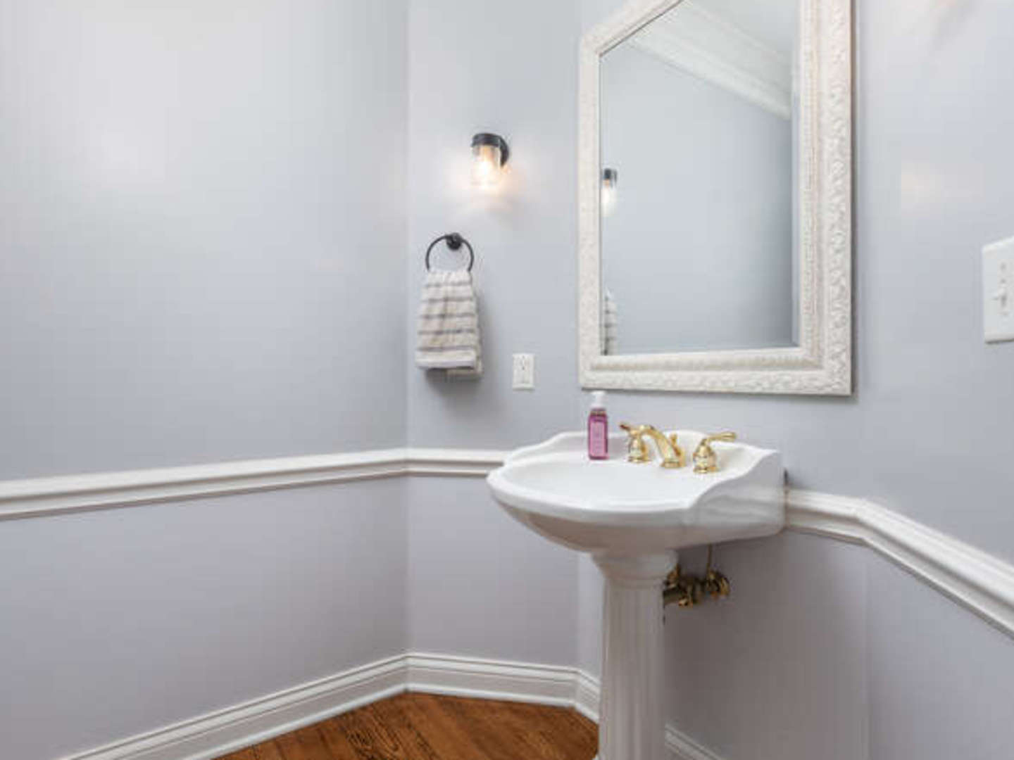 40-w046 Carl Sandburg Road St. Charles, IL 60175 - Photo 13 of 29 a bathroom with a sink a mirror and a window