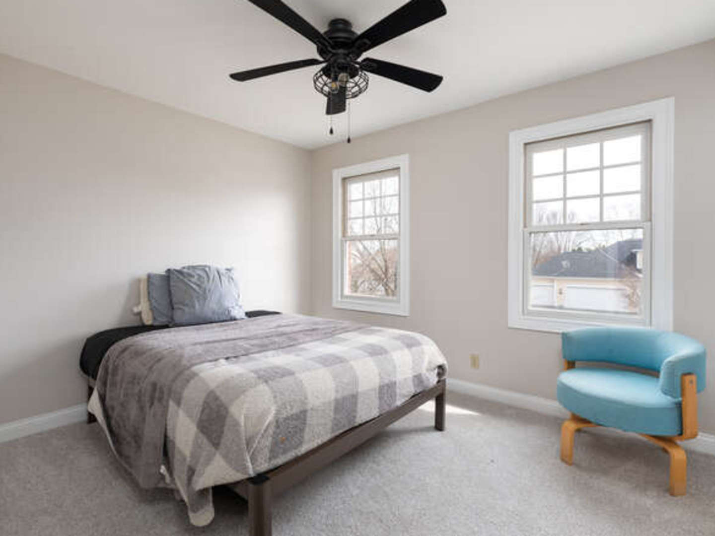 40-w046 Carl Sandburg Road St. Charles, IL 60175 - Photo 19 of 29 a bedroom with a bed a couch and a window