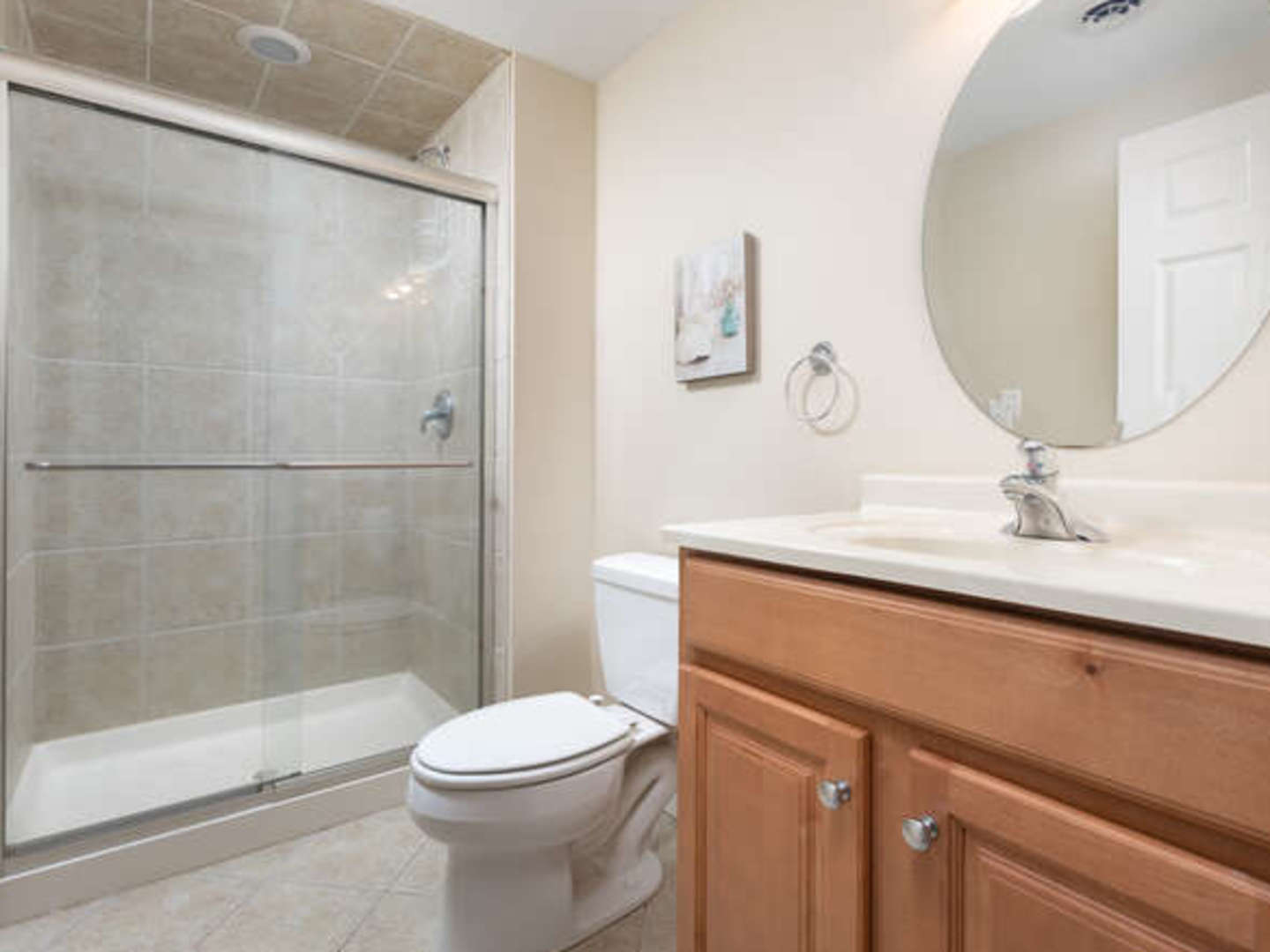 40-w046 Carl Sandburg Road St. Charles, IL 60175 - Photo 28 of 29 a bathroom with a sink a toilet and shower