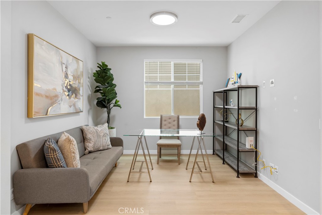 136 Modjeska Irvine, CA 92618 - Photo 16 of 39 a workspace with furniture and a window