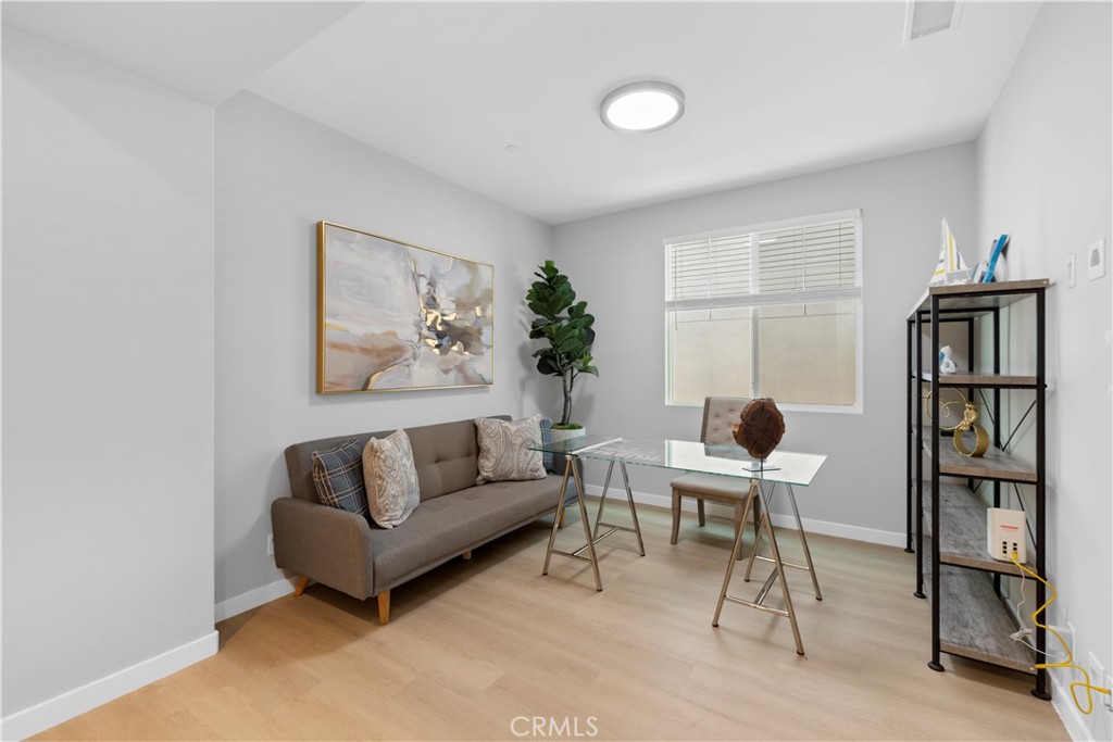 136 Modjeska Irvine, CA 92618 - Photo 17 of 39 a living room with furniture a rug and a window