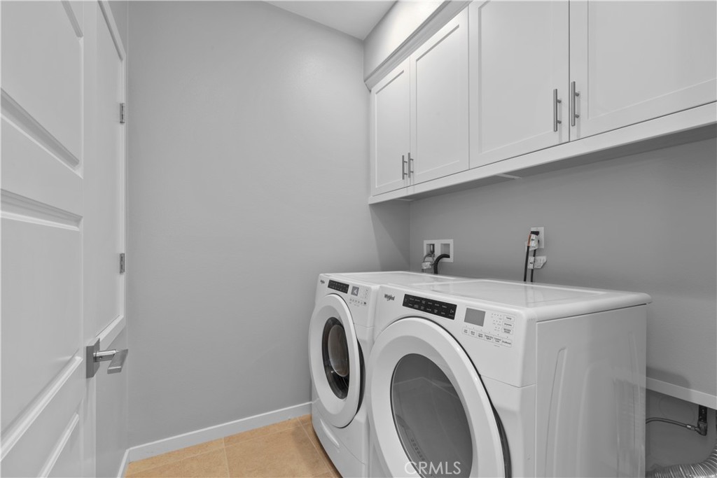 136 Modjeska Irvine, CA 92618 - Photo 28 of 39 a utility room with dryer and washer