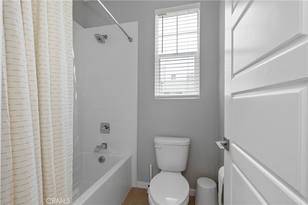 136 Modjeska Irvine, CA 92618 - Photo 33 of 39 a white toilet sitting next to a bath tub