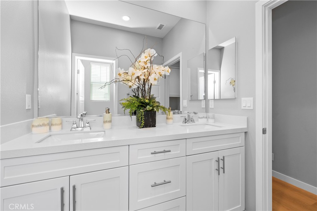136 Modjeska Irvine, CA 92618 - Photo 34 of 39 a bathroom with a sink and a mirror