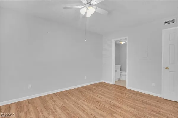 a car parked in front of a house