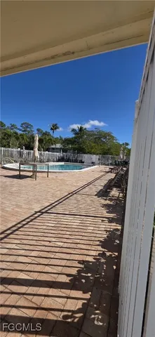 a view of a porch with a yard