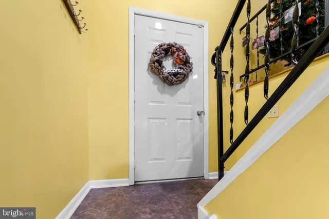 a view of a hallway with entryway