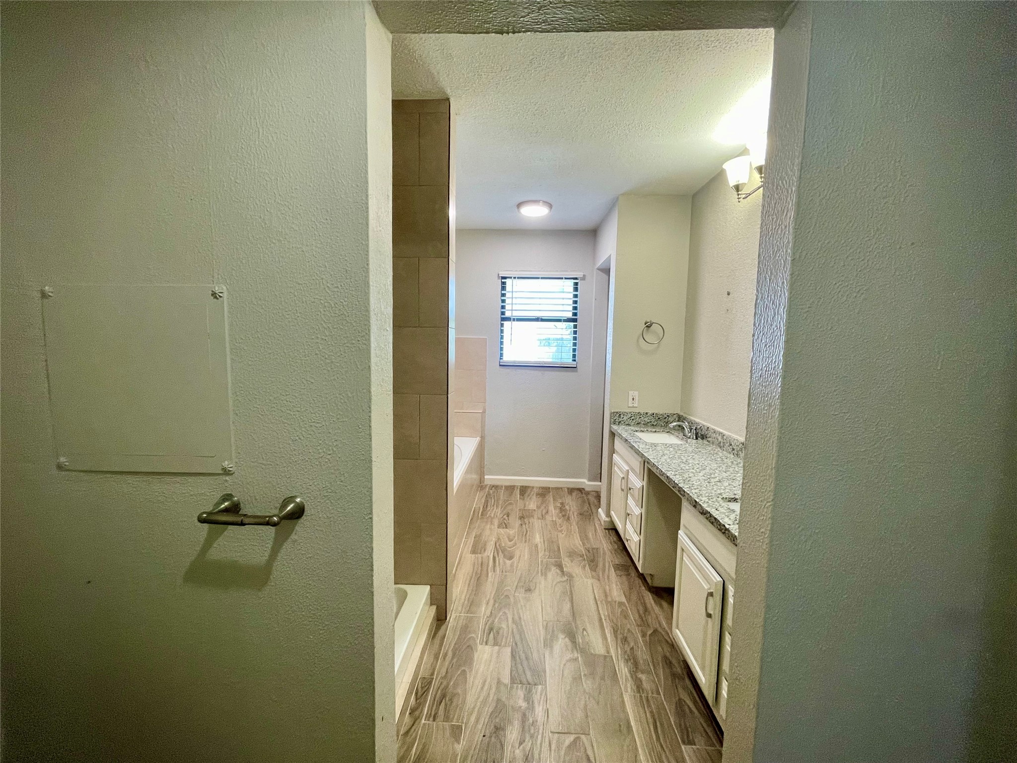 300 Hargett Street Clute, TX 77531 - Photo 17 of 36 a bathroom with a sink and mirror
