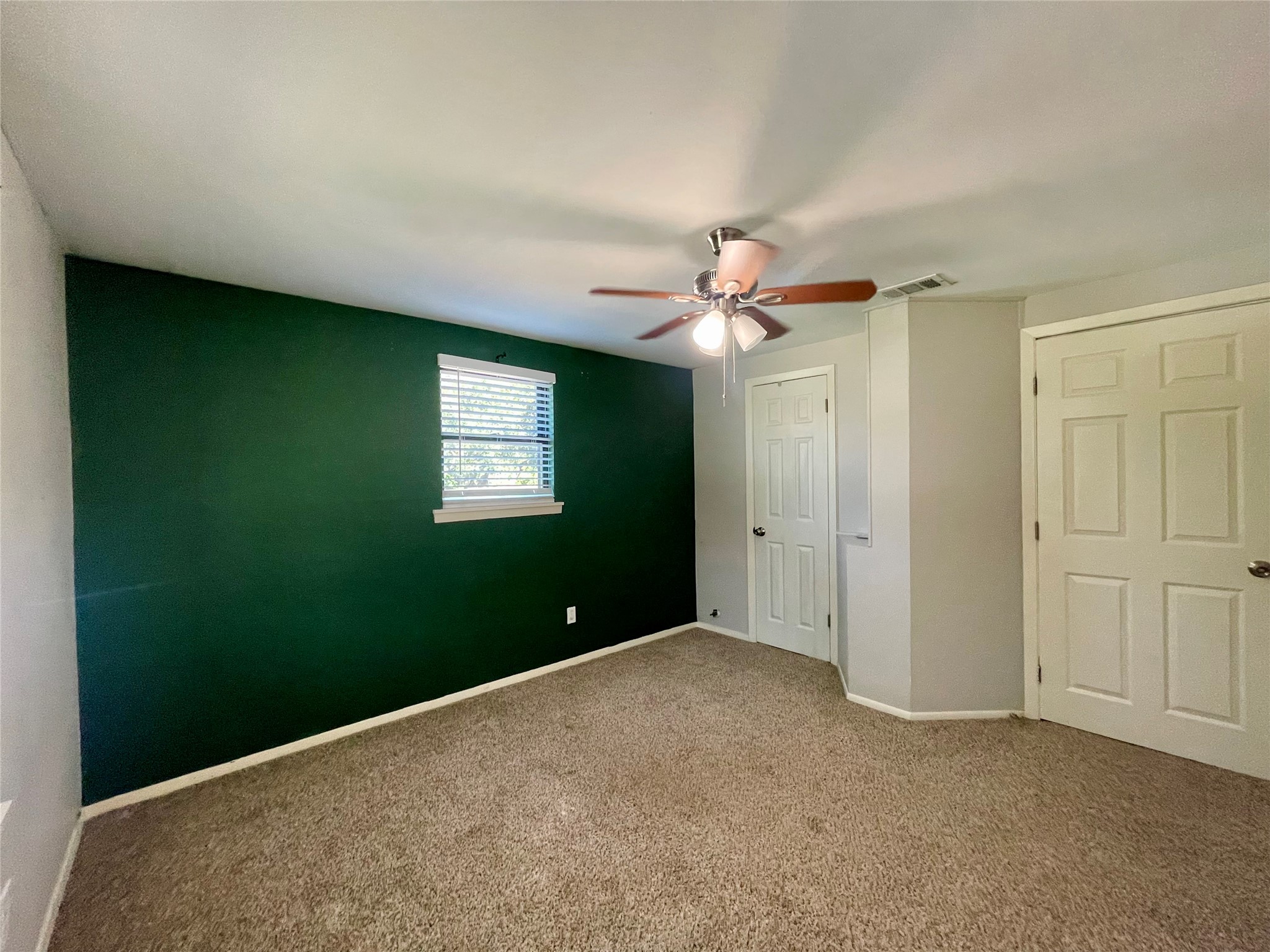 300 Hargett Street Clute, TX 77531 - Photo 27 of 36 a view of an empty room with a window