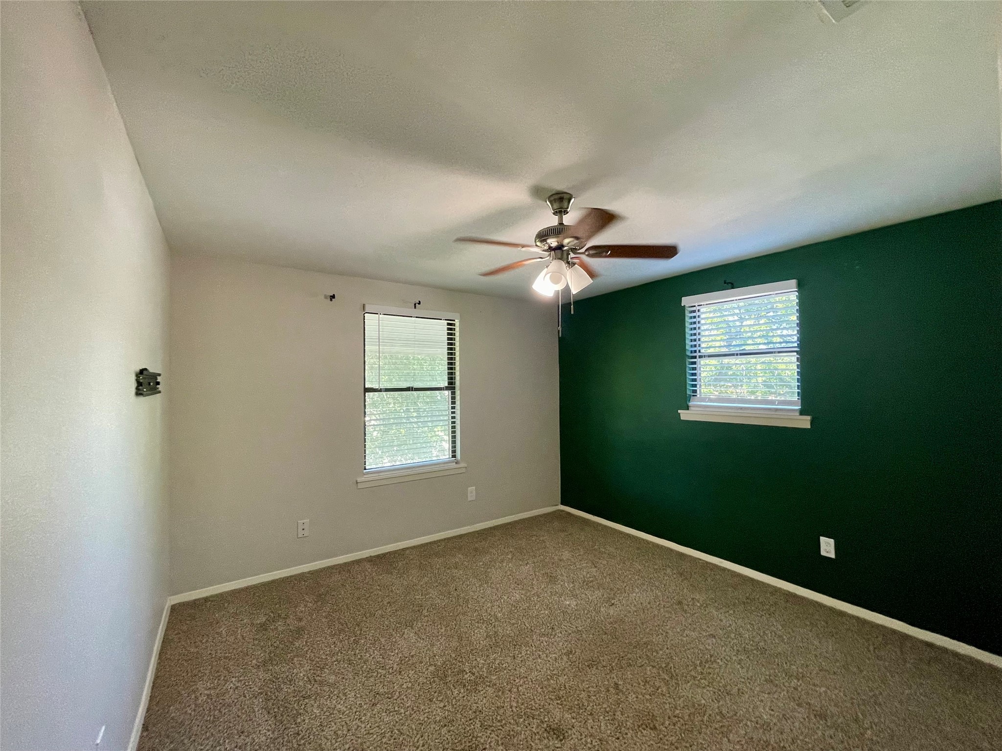 300 Hargett Street Clute, TX 77531 - Photo 28 of 36 a view of an empty room with a window