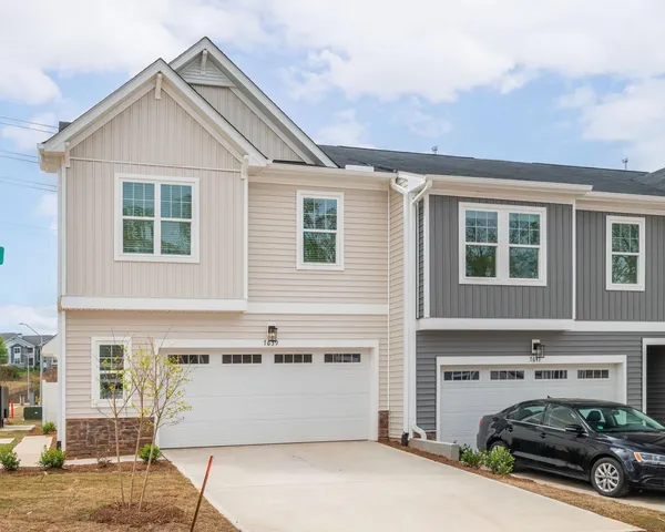 a view of parking house and car parked