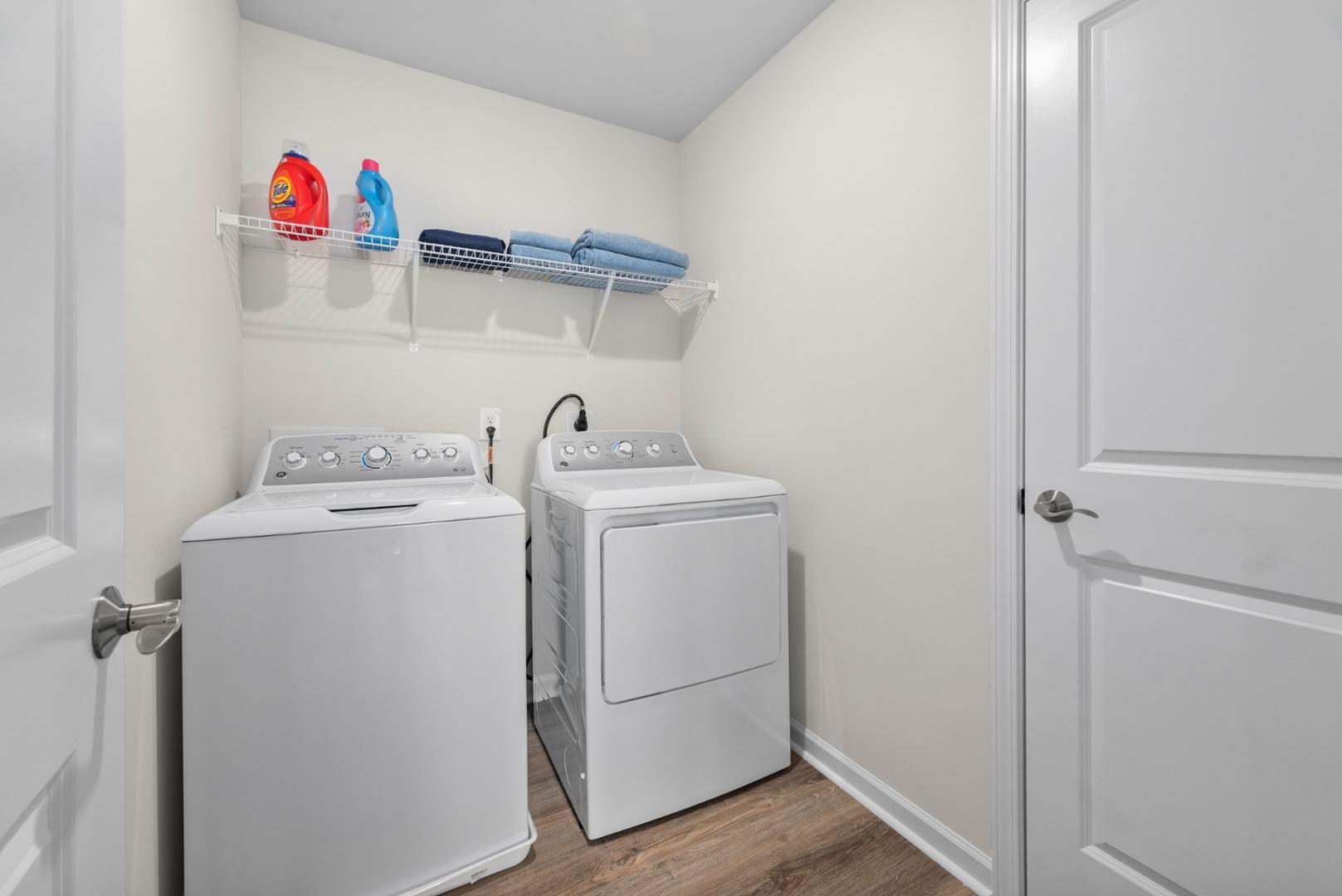 7610 Waypond Court Raleigh, NC 27617 - Photo 13 of 13 a utility room with dryer and washer