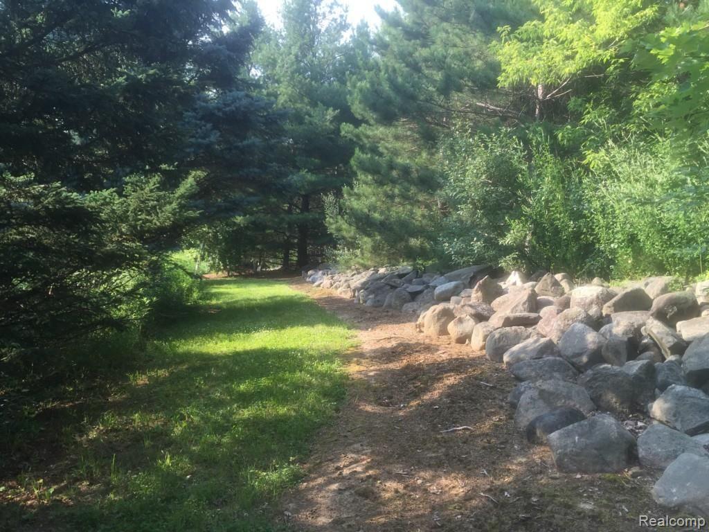 3850 West Oregon Road Lapeer, MI 48446 - Photo 85 of 94 Natural rock walls on a trail.