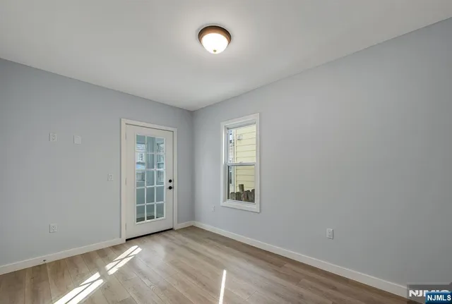 an empty room with windows