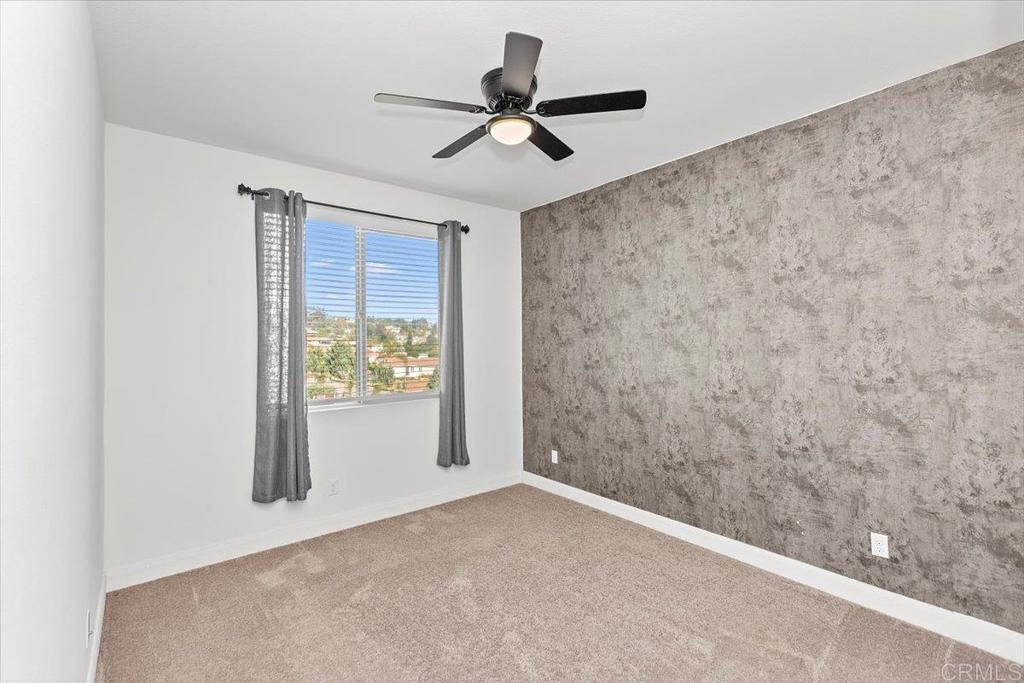 2465 Solara Lane Vista, CA 92081 - Photo 20 of 48 a view of empty room with ceiling fan