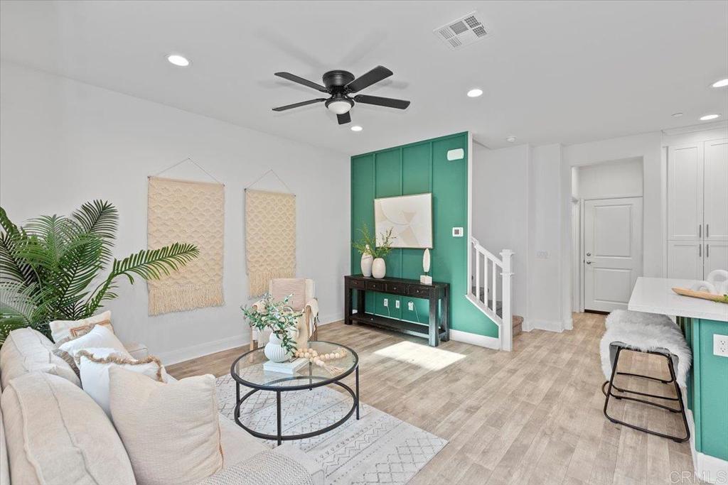 2465 Solara Lane Vista, CA 92081 - Photo 2 of 48 a living room with furniture
