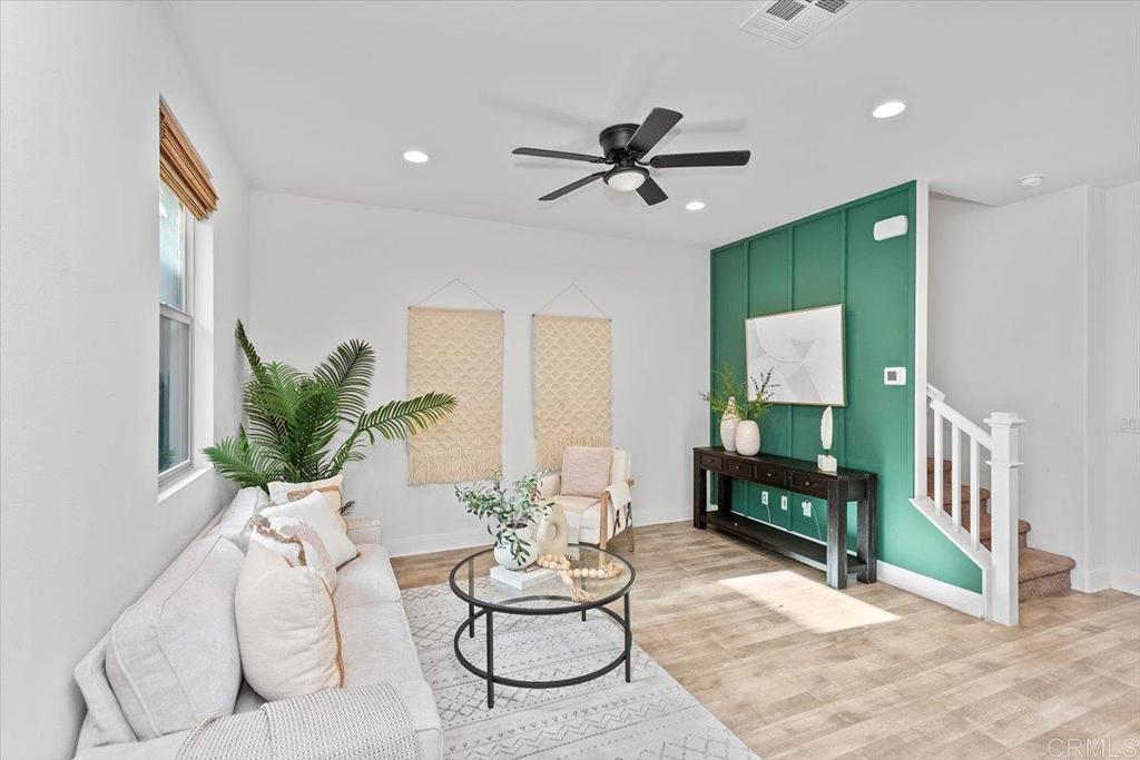 2465 Solara Lane Vista, CA 92081 - Photo 4 of 48 a living room with furniture