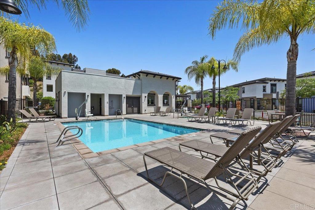 2465 Solara Lane Vista, CA 92081 - Photo 42 of 48 a view of a patio with swimming pool table and chairs