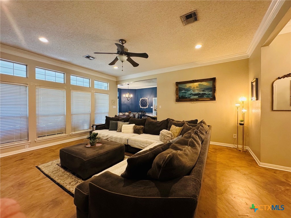 115 Oak Ridge Road Gatesville, TX 76528 - Photo 7 of 37 a living room with furniture and a flat screen tv