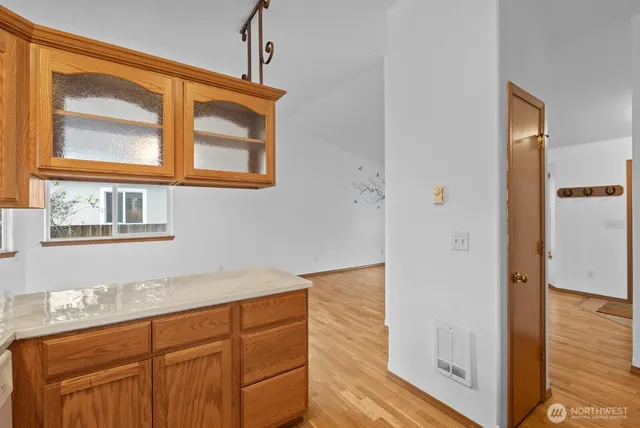 a bathroom with a sink a toilet and a shower