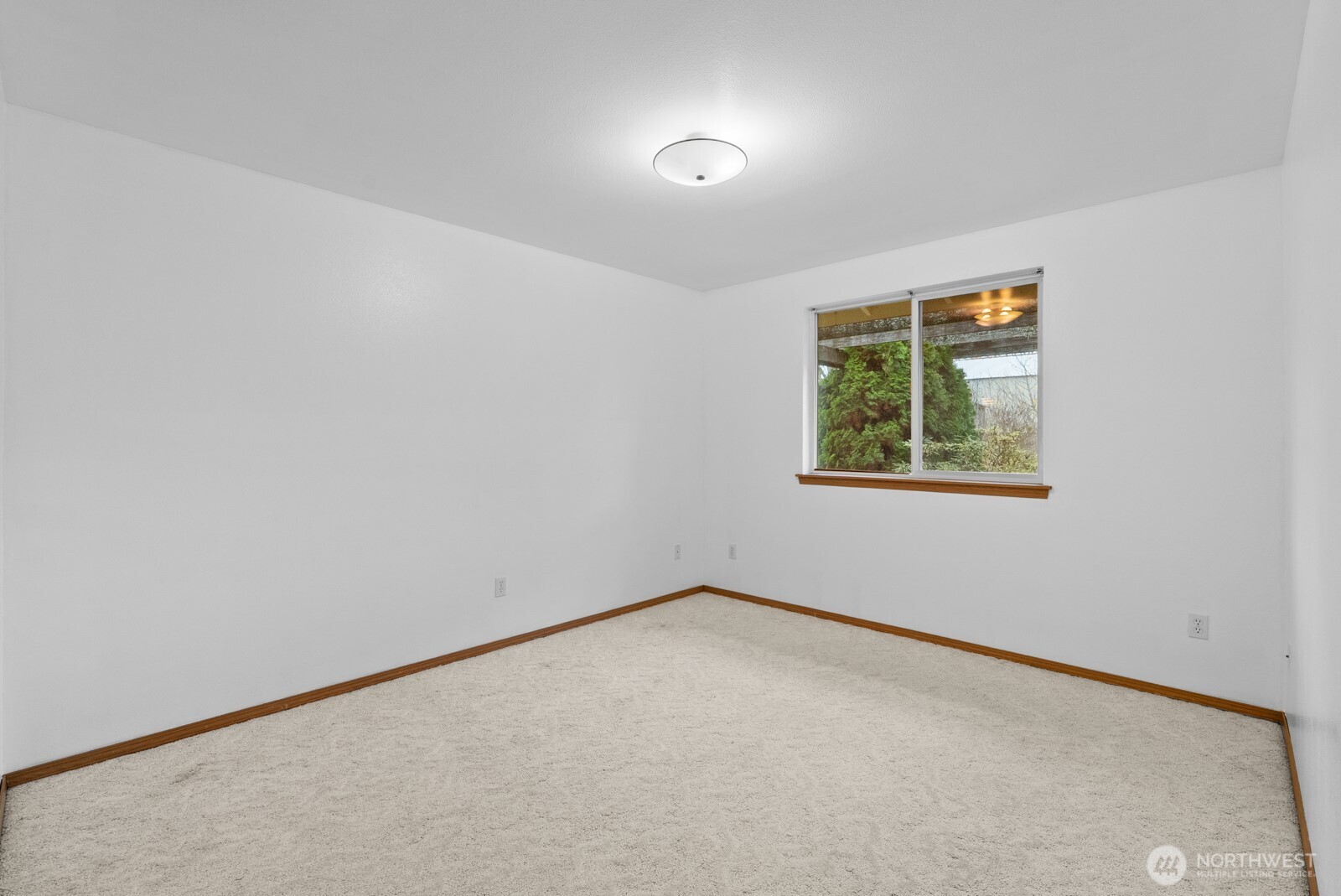 215 James Street Roy, WA 98580 - Photo 18 of 26 an empty room with a window