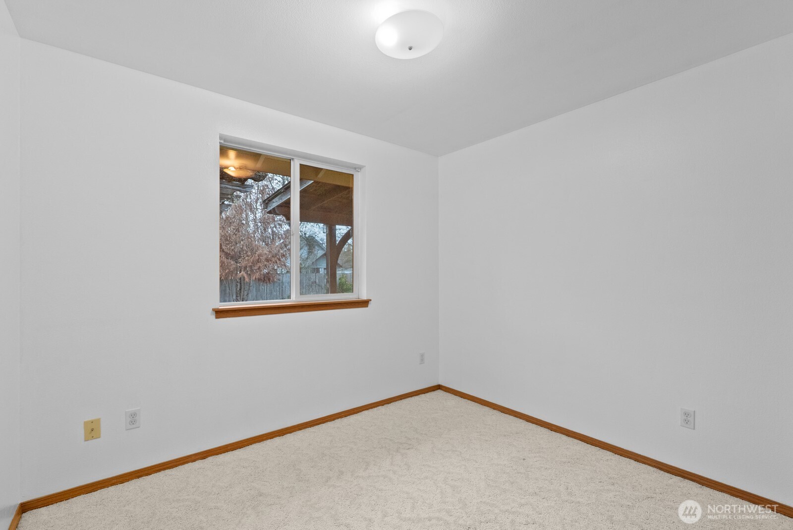 215 James Street Roy, WA 98580 - Photo 19 of 26 a view of an empty room with a window