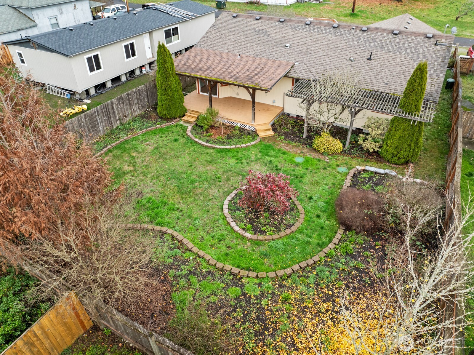 215 James Street Roy, WA 98580 - Photo 21 of 26 an aerial view of a house with backyard