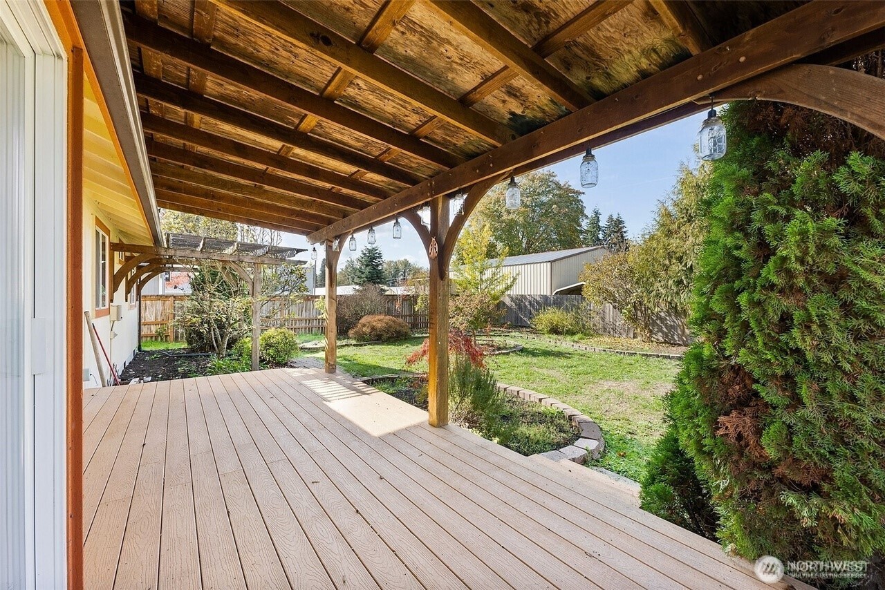 215 James Street Roy, WA 98580 - Photo 4 of 26 a view of backyard with wooden floor and outdoor seating