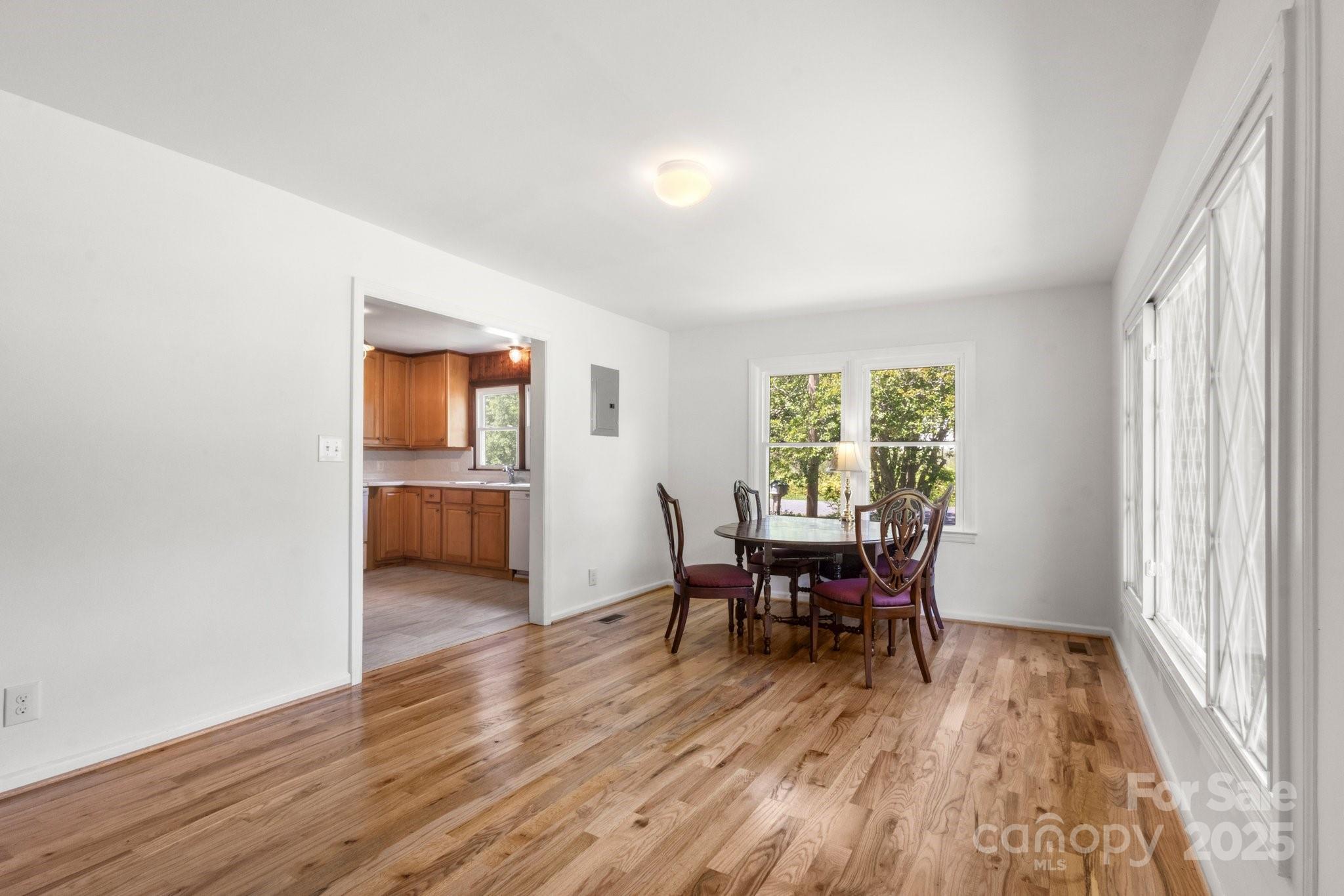 1725 Fallston Road Shelby, NC 28150 - Photo 7 of 35 a view of a dining room with furniture window and wooden floor